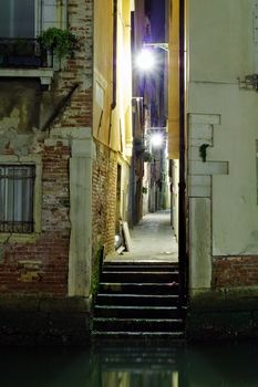Venetian alley in the darkness