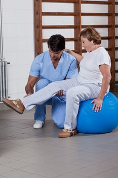 Physical Therapist helping a Patient
