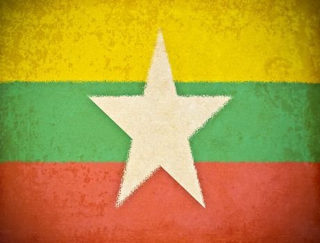 old grunge paper with Myanmar flag background