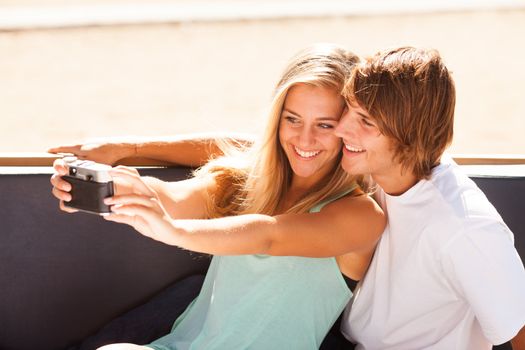 Young beautiful couple taking selfportrait