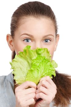 Young beauty woman with green lettuce