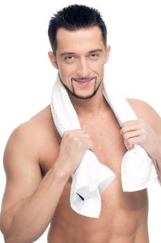 Young man with white towel. SPA. Isolated.