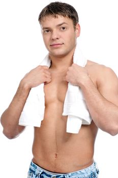 A young man with a towel