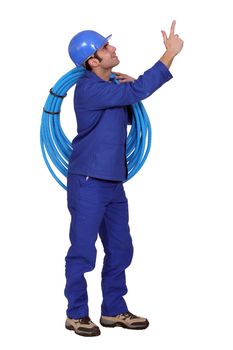Man carrying coil