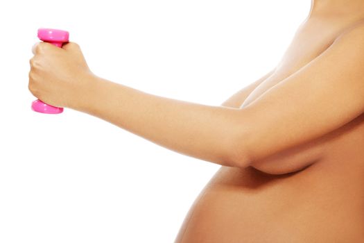 Pregnant woman holding dumbbell 