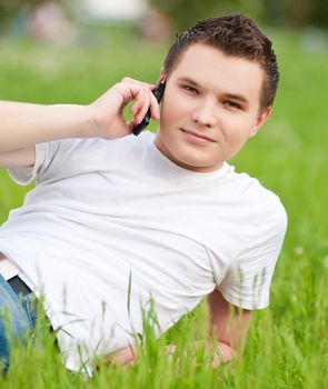 young guy talking on mobile phone