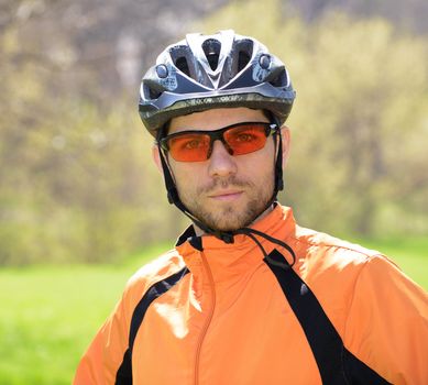 Portrait of Young Cyclist in Helmet
