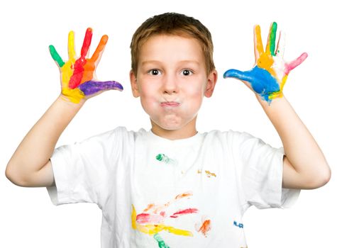 boy shows his hands painted with paint