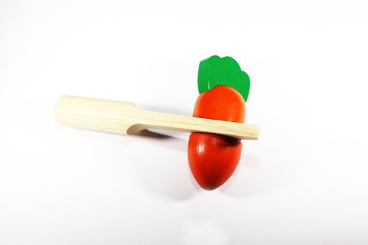 carrot orange colored wooden toy for babies