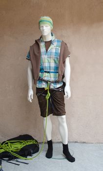 Mannequin with mountaineering equipment