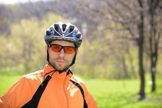 Portrait of Young Cyclist in Helmet