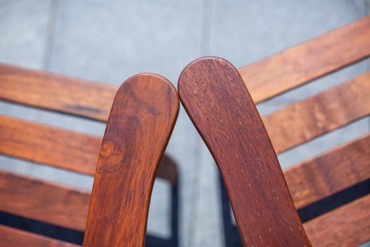two wooden chairs in the garden
