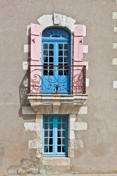 Oldfashioned window with balcony