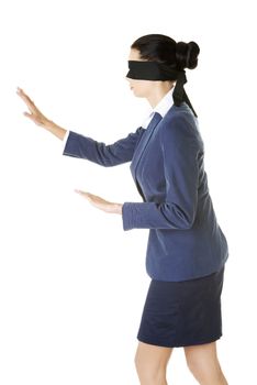 Portrait of a beautiful young blindfold businesswoman