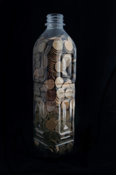 Bottle with coins
