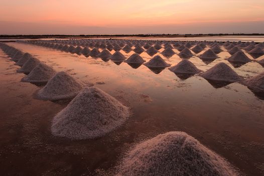Beautiful landscape of a summer with a salt farm in T้hailand.