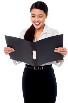 Female assistant reviewing file