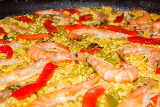 Detail of traditional spanish paella cooked in a pan