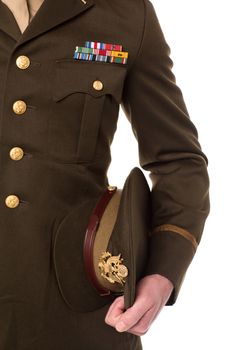 Military personnel holding his precious cap