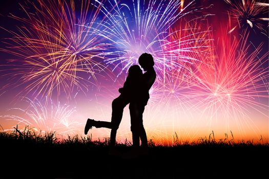 loving young couple with fireworks background