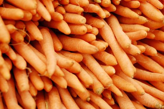 Fresh carrots piled high