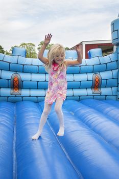 Child in bouncing castle
