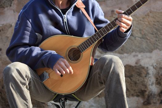 Man playing a mandolin