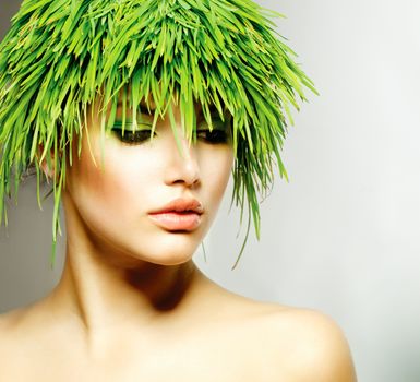 Beauty Spring Woman with Fresh Green Grass Hair 
