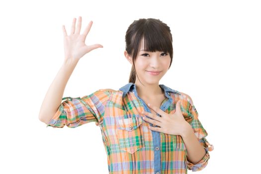 Asian young woman give a gesture of swear