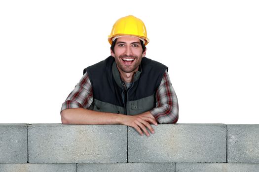 Portrait of a smiling stonemason