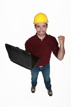 tight-fisted craftsman with laptop
