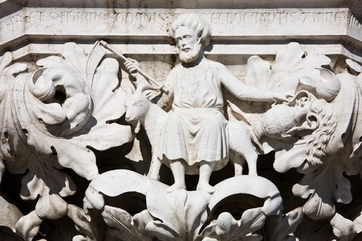 sculture of saint mark on his donkey