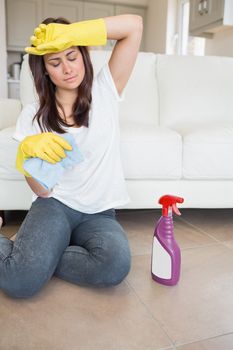 Woman exhausted doing the housework