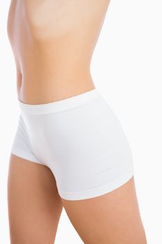 Female slender body in shorts