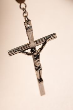 Close up of crucifix of rosary beads