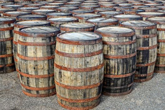 Detail of stacked whisky casks and barrels
