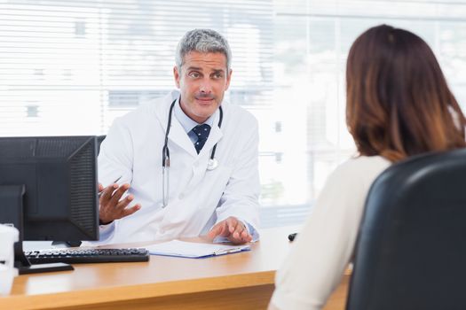 Doctor explaining an illness to his patient
