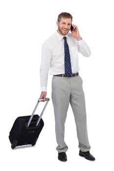 Cheerful businessman answering phone