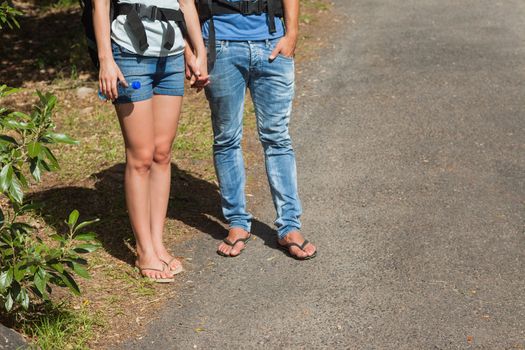 Legs of couple going for a trek together