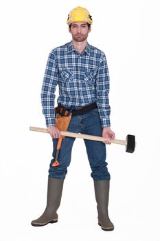 Man holding sledge-hammer