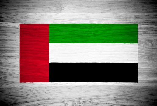United Arab Emirates flag on wood texture