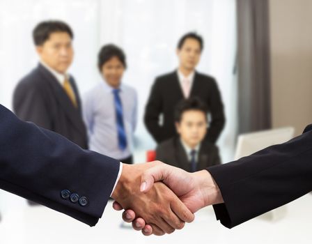 Businessman handshake with colleague