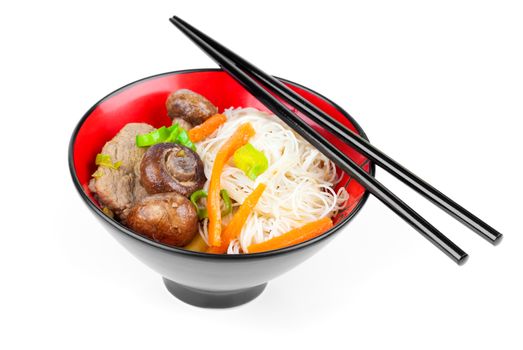 Chinese noodles with beef and vegetables, oriental cuisine 