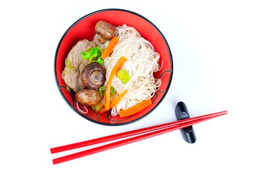 Chinese noodles with beef and vegetables, oriental cuisine