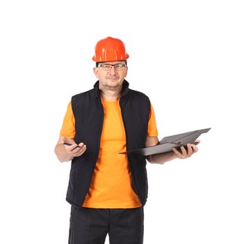 Man in workwear and hard hat with a folder
