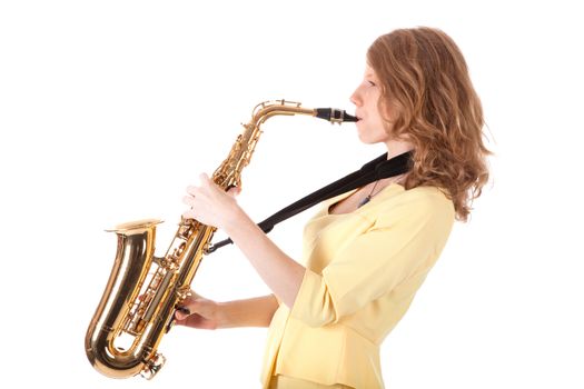young woman in yellow playing the alto saxophone