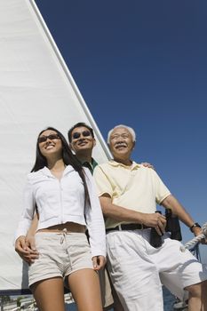 Family on sailboat smiling