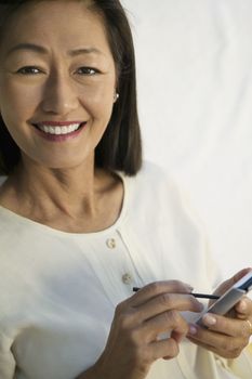Woman using PDA portrait