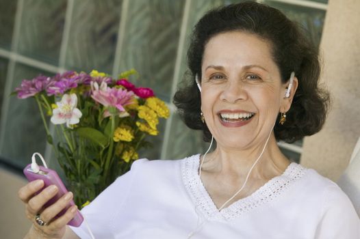 Woman Listening to Music on MP3 Player