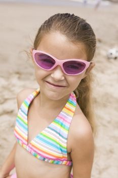 Portrait of girl on beach smiling